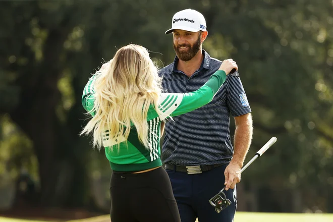 Dustin Johnson se je veselil z zaročanko Paulino Gretzky.&nbsp;FOTO:&nbsp; Patrick Smith/AFP