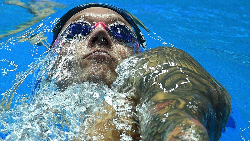 Fotografija: Caeleb Dressel ruši mejnike v plavanju. FOTO: Oli Scarff/AFP