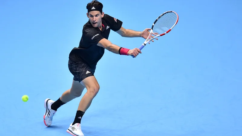 Fotografija: Dominic Thiem je prišel do dragocene zmage po dveh urah in 26 minutah hudega boja. FOTO: Glyn Kirk/AFP