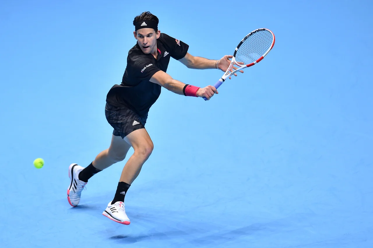 Fotografija: Dominic Thiem je prišel do dragocene zmage po dveh urah in 26 minutah hudega boja. FOTO: Glyn Kirk/AFP