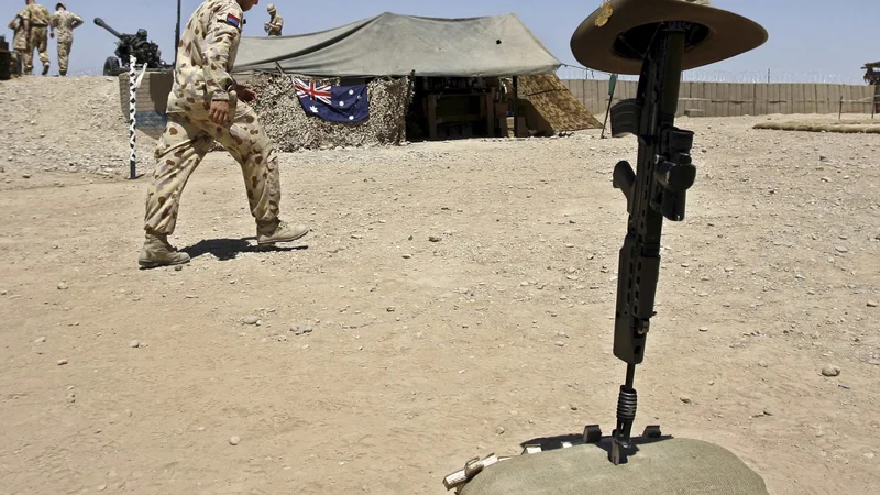 Fotografija: Avstralski vojaki v oporišču Armadillo v afganistanski provinci Helmand leta 2008. FOTO: Omar Sobhani/Reuters