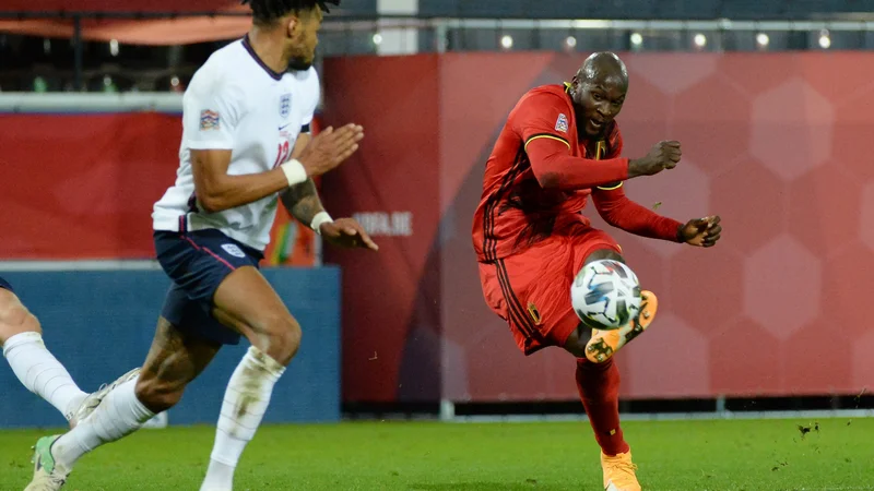 Fotografija: Belgijec Romelu Lukaku (desno) je najboljši strelec v ligi narodov A s petimi goli. FOTO: Johanna Geron/Reuters