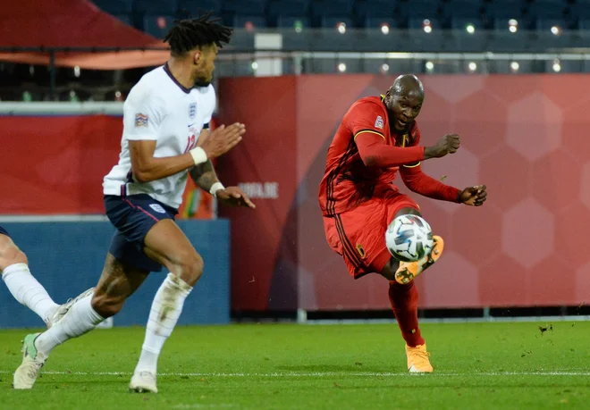 Belgijec Romelu Lukaku (desno) je najboljši strelec v ligi narodov A s petimi goli. FOTO: Johanna Geron/Reuters