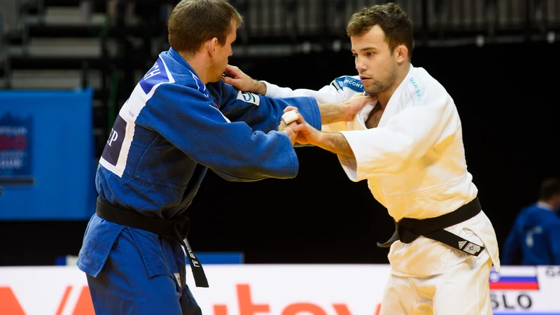 Fotografija: Adrian Gomboc (desno) vztraja, da je bil boljši od Francoza Kiliana Le Bloucha. FOTO: Rok Rakun/JZS