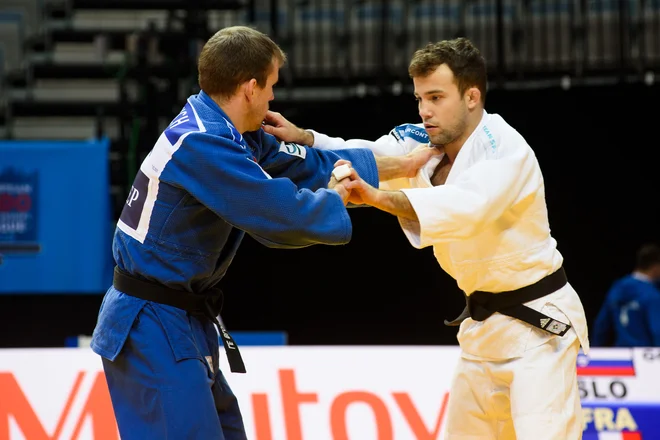 Adrian Gomboc (desno) vztraja, da je bil boljši od Francoza Kiliana Le Bloucha. FOTO: Rok Rakun/JZS
