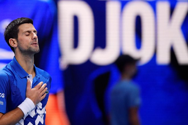 Đoković se bo vnovič potegoval za končno zmago na londonskem turnirju. FOTO: Toby Melville/Reuters