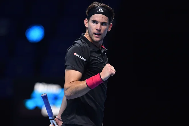 Dominic Thiem se je drugo leto zapored uvrstil v finale zaključnega turnirja. FOTO: Glyn Kirk/AFP