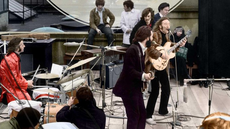 Fotografija: Zadnji skupni nastop Ringa Starra, Georgea Harrisona, Paula McCartneyja in Johna Lennona kot The Beatles je bil na strehi njihove založbe Apple 30. januarja 1969 in prikazan leta 1970 v dokumentarnem filmu Let It Be. Foto Apple Corps