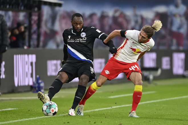 Kevin Kampl je s soigralci premagal Arminio Bielefeld in se povzpel na drugo mesto. FOTO: John Macdougall/AFP
