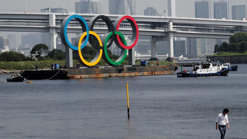 Fotografija: Olimpijske kroge bo treba ponovno prebarvati. FOTO: Foto Kim Kyung-hoon Reuters