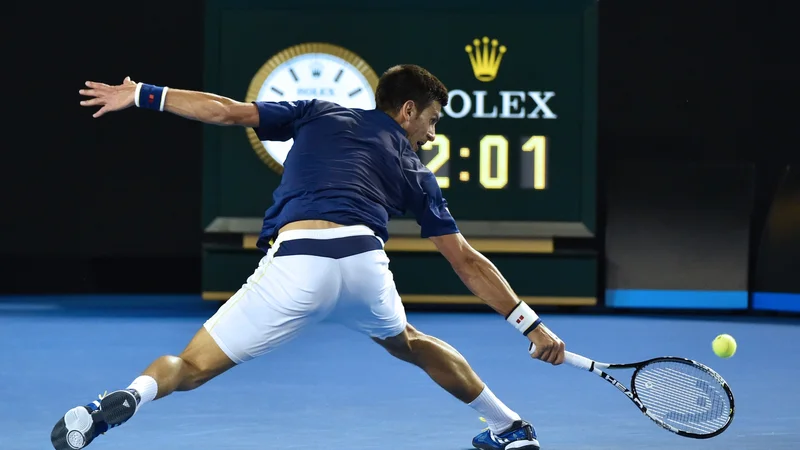 Fotografija: Na OP Avstralije bo naslov prvaka med posamezniki branil Srb Novak Đoković. FOTO: Saeed Khan/AFP - International News Agency