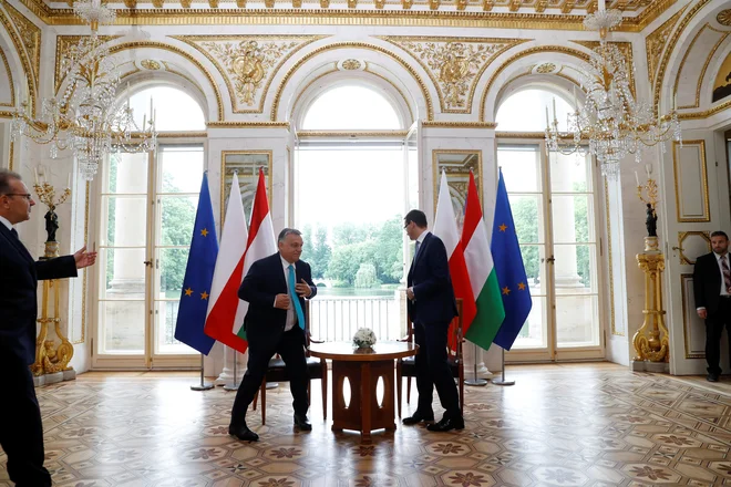Pričakovati je, da bosta Poljska in Madžarska na koncu le popustili.<br />
FOTO: Kacper Pempel/Reuters