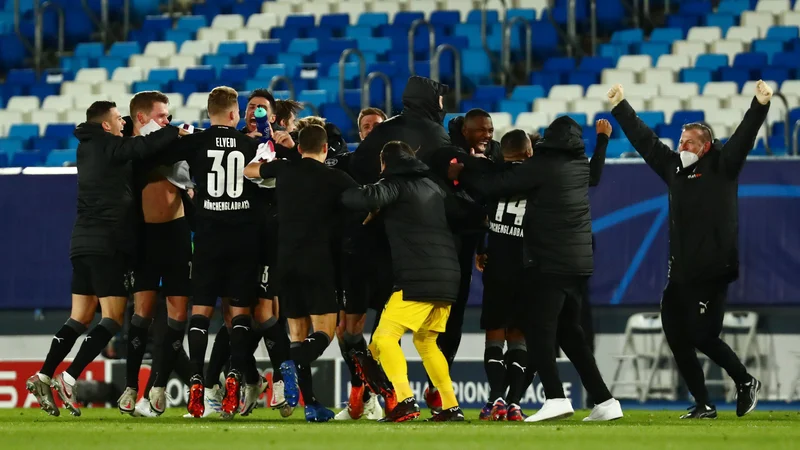 Fotografija: Borussia je izgubila proti Realu, vendar pa ji to ni pokvarilo veselja ob napredovanju. FOTO: Sergio Perez/Reuters