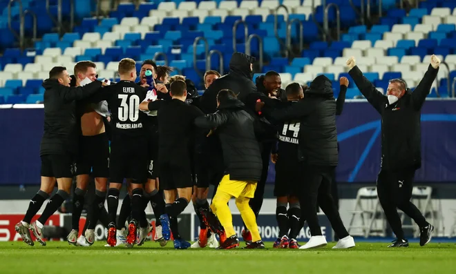 Borussia je izgubila proti Realu, vendar pa ji to ni pokvarilo veselja ob napredovanju. FOTO: Sergio Perez/Reuters