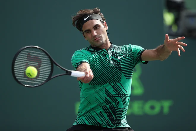 Roger Federer je v svoji bogati teniški karieri osvojil kar 20 naslovov na turnirjih za grand slam. FOTO: Julian Finney/AFP