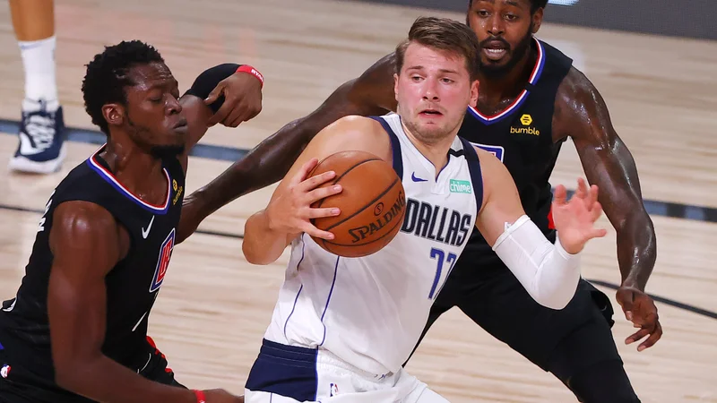 Fotografija: Luka Dončić je že nared za novo košarakarsko sezono v najmočnejši ligi, ki jo bo Dallas začel 23. t. m. FOTO: Kevin C. Cox/AFP