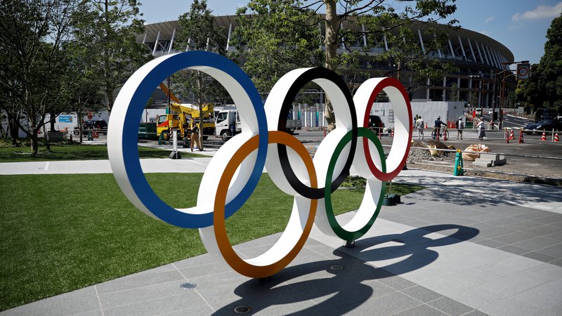 Fotografija: Prireditelji olimpijskih iger v Tokiu so nared, večina Japoncev pa bi raje videla, da OI ne bi bilo. FOTO: Issei Kato/Reuters