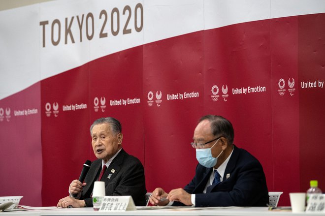 Joširo Mori (levo), predsednik odbora za organizacijo olimpijskih iger, ima polne roke dela. FOTO: Carl Court/Reuters