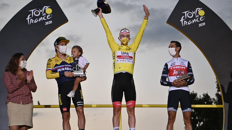 Slovensko kolesarstvo je z dvojnim zmagoslavjem na Tour de France Tadeja Pogačarja in Primoža Rolgiča (levo) doseglo enega od največjih športnih podvigov Slovenije v zgodovini. FOTO: Anne-Christine Poujoulat/AFP