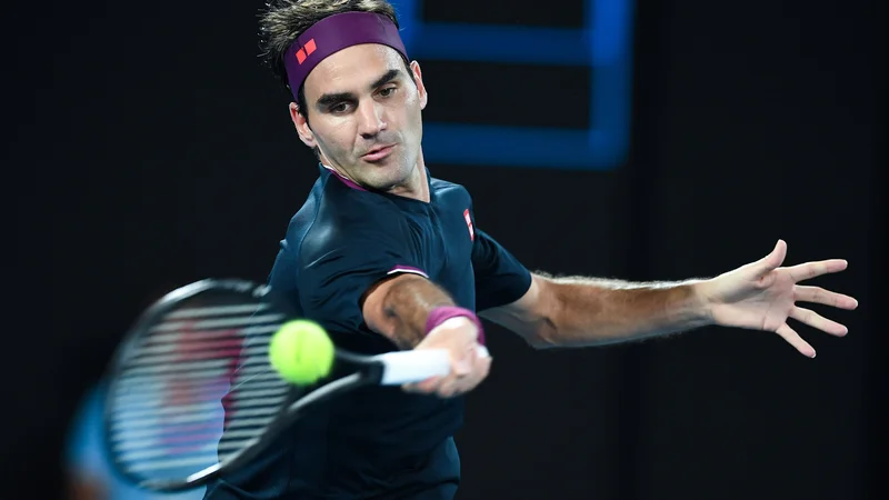 Fotografija: Roger Federer bo zavoljo okrevanja izpustil prvi grand slam sezone. FOTO: Greg Wood/AFP
