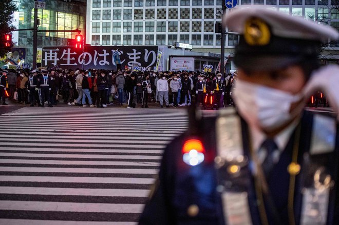 Četrt Šibuja v Tokiu na zadnji dan leta. FOTO: Philip Fong/AFP