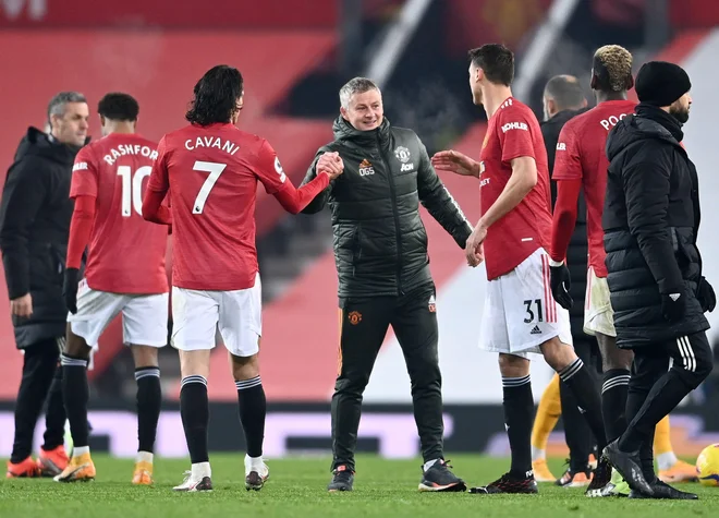 Ole Gunnar Solskjaer po zadnji zmagi nad Wolverhamptonom ni skrival veselja. FOTO: Laurence Griffiths/Reuters