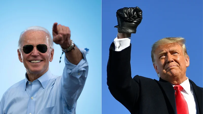 Fotografija: Pred letom dni so Donaldu Trumpu (desno) napovedovali gladko volilno zmago, Bela hiša pa se zdaj obeta Joeju Bidnu.
FOTO: Mandel Ngan/AFP