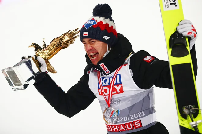 Kamil Stoch se je takole veselil že svojega tretjega »zlatega orla«. FOTO: Lisi Niesner/Reuters