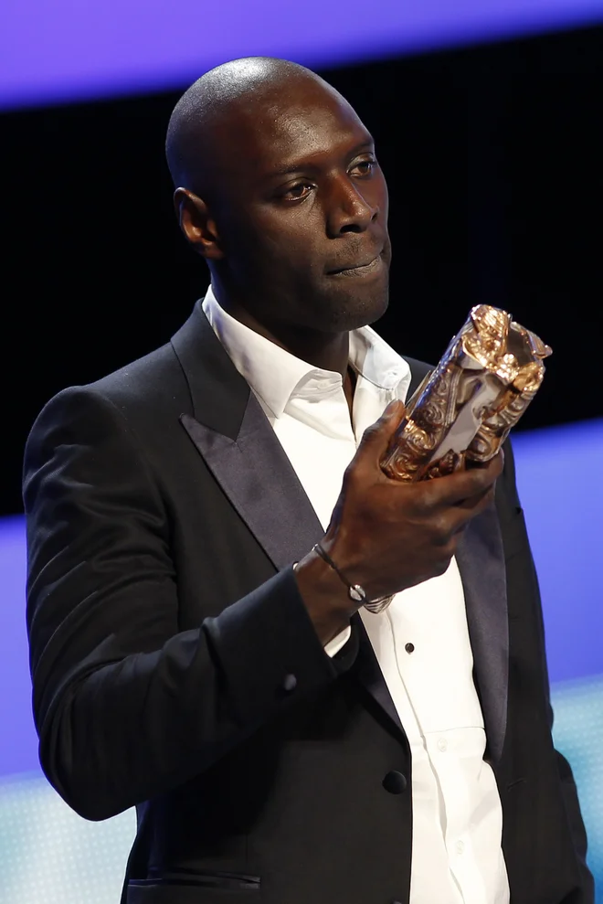 Francoski igralec Omar Sy navdušuje svetovno javnost. <br />
FOTO: Benoit Tessier/Reuters
