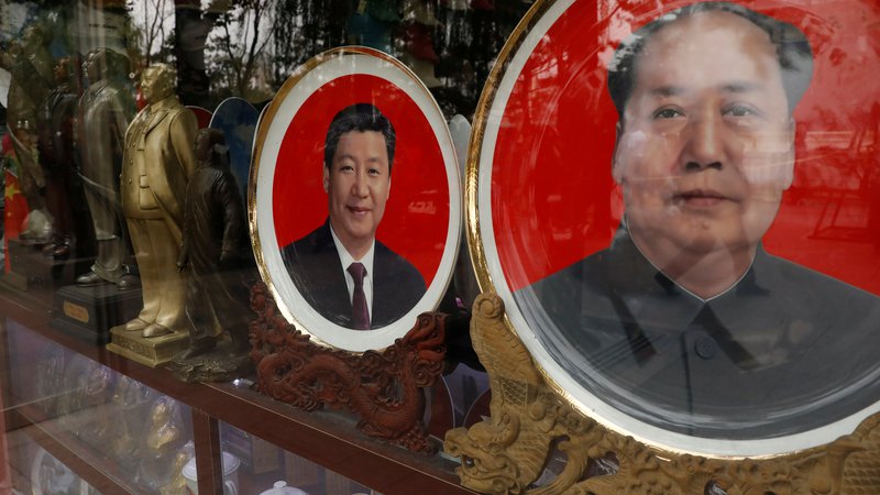 Fotografija: Xi Jinping (levo) velja za najmočnejšega kitajskega voditelja po Mao Zedongu. FOTO: Tyrone Siu/Reuters