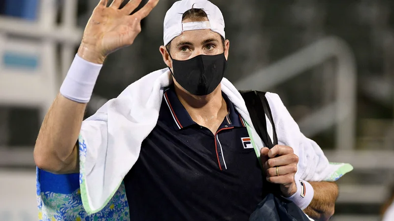 Fotografija: John Isner ne bo nastopil na prvem turnirju za grand slam v tej sezoni. FOTO: Mark Brown/AFP
