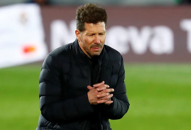 Diego Simeone ve, da tekma proti Sevilli ne bo lahka za Madridčane. FOTO: Juan Medina/Reuters