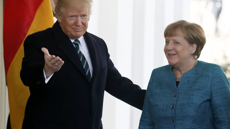 Angeli Merkel se je obrestovala stoična potrpežljivost v odnosih z Donaldom Trumpom. FOTO: Jim Bourg/Reuters