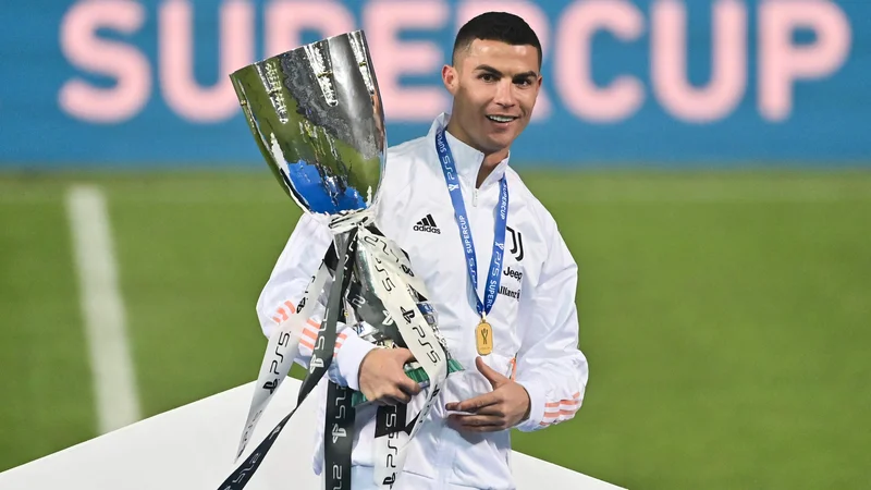 Fotografija: Cristiano Ronaldo je strelski rekord polepšal z osvojitvijo italijanskega superpokala. FOTO: Miguel Medina/AFP