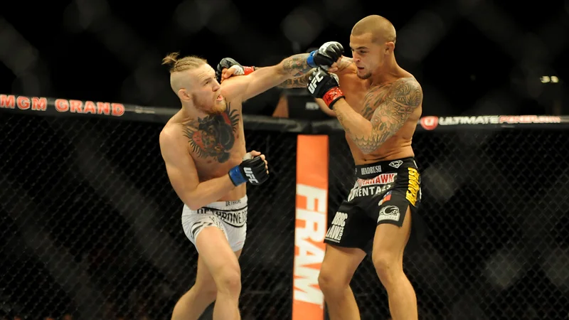 Fotografija: V prvem medsebojnem obračunu je Conor McGregor (levo) pred dobrimi šestimi leti v Las Vegasu že po vsega minuti in 46 sekundah s tehničnim nokavtom premagal Dustina Poirierja (desno). FOTO: Usa Today Sports