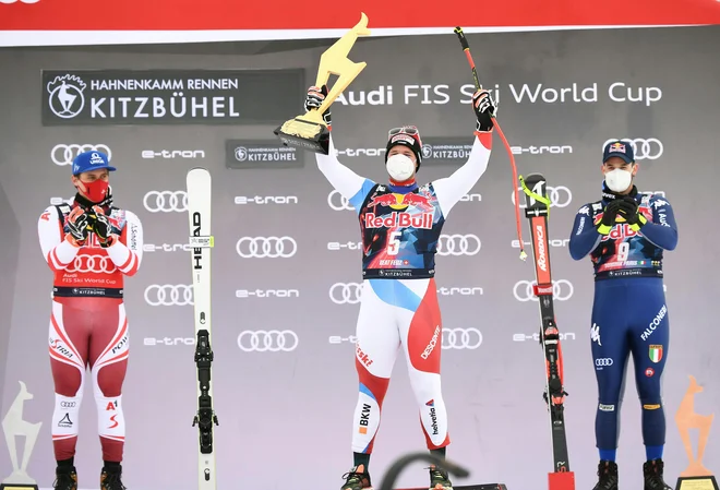 Najhitrejša trojica v Kitzbühlu: Matthias Mayer, Beat Feuz in Dominik Paris (z leve). FOTO: Helmut Fohringer/AFP