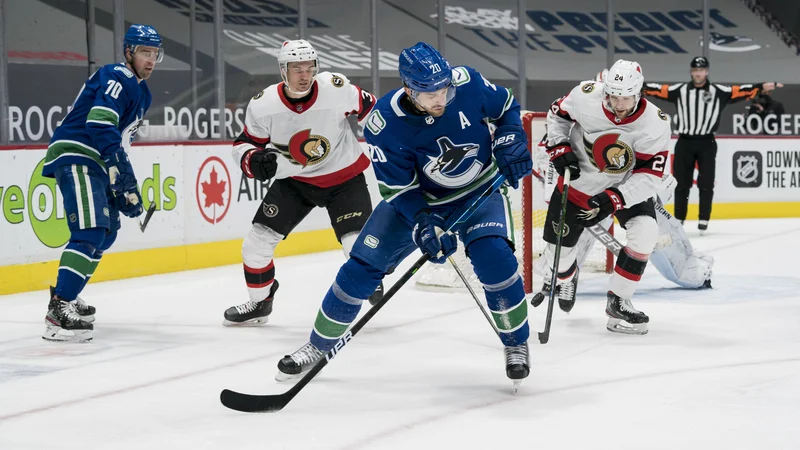 Fotografija: Napadalec Vancouvra Brandon Sutter (20) je pri visoki zmagi dosegel 3 gole. FOTO: Bob Frid Usa/Today Sports