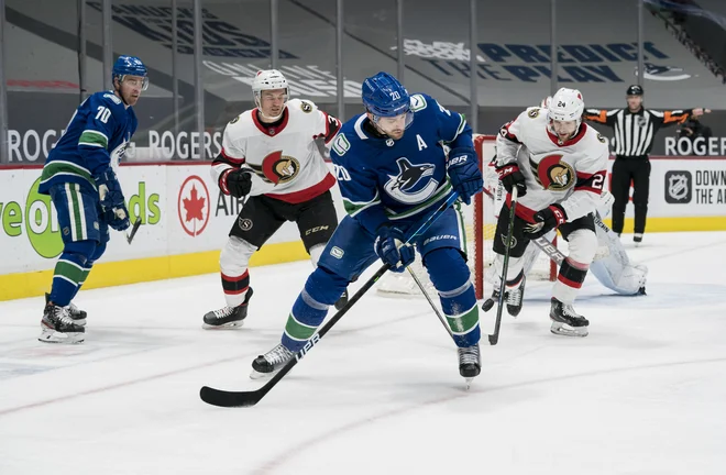 Napadalec Vancouvra Brandon Sutter (20) je pri visoki zmagi dosegel 3 gole. FOTO: Bob Frid Usa/Today Sports