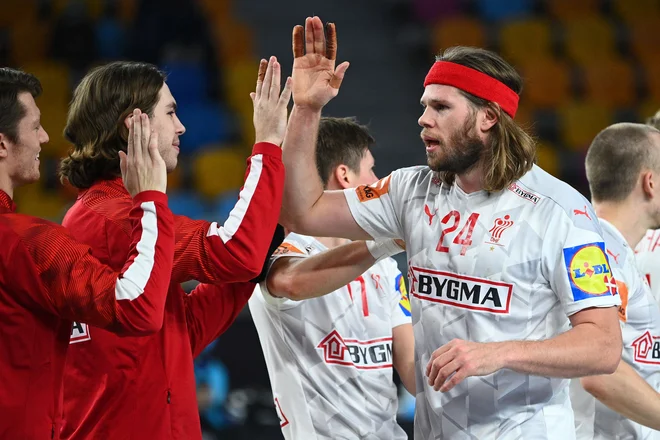 Mikkel Hansen (desno) je Špancem zabil kar ducat golov. FOTO: Anne-Christine Poujoulat/AFP