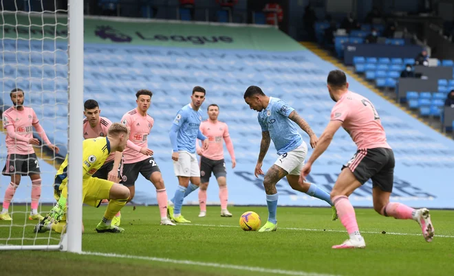 Vodilni City je z golom Gabriela Jesusa premagal Sheffield United. FOTO: Michael Regan/Reuters
