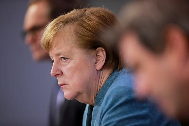 Nemška kanclerka Angela Merkel je po današnjem srečanju s predsedniki deželnih vlad in proizvajalci cepiv ocenila, da se bodo do konca poletja lahko cepili vsi, ki bodo to želeli. Foto: Hannibal Hanschke/Reuters