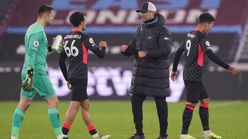 Fotografija: Novi sev koronavirusa je največ preglavic povzročil klubom, ki se bodo pomerili z angleškimi tekmeci. Liverpool bi moral izločilne tekme v ligi prvakov začeti v Lepzigu. FOTO: John Walton/AFP
