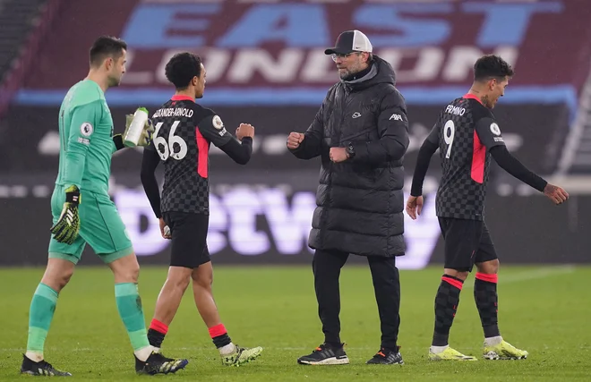 Novi sev koronavirusa je največ preglavic povzročil klubom, ki se bodo pomerili z angleškimi tekmeci. Liverpool bi moral izločilne tekme v ligi prvakov začeti v Lepzigu. FOTO: John Walton/AFP