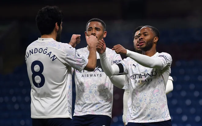 Takole so se nogometaši Manchester Cityja veselili nove zmage in vrha lestvice. FOTO: Gareth Copley/AFP