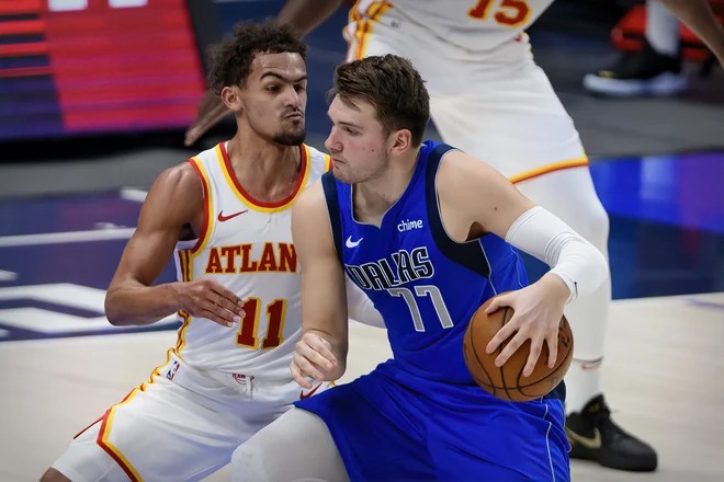 Luka Dončić in Trae Young sta stara in znana tekmeca, ki sta tekmovalnosdst v NBA začela že z menjavo na naboru. FOTO:&nbsp; Jerome Miron/Usa Today Sports