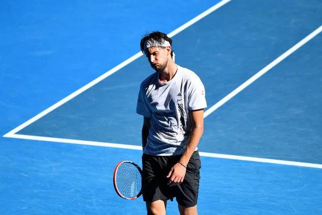 Dominic Thiem je bil preveč izčrpan in utrujen za enakovrednejši dvoboj z Grigorjem Dimitrovim, FOTO: William West/AFP