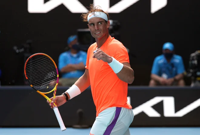 Rafael Nadal je bil vesel, potem ko je pod njegovim loparjem padel tudi Italijan Fabio Fognini. FOTO: Loren Elliott/Reuters