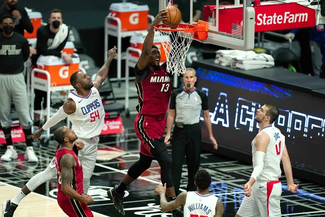 Miamijev center Bam Adebayo je imel odličen večer proti LA Clippers, a lanski finalst je vsseeno izgubil proti LA Clippers. FOTO: Kirby Lee/Usa Today Sports