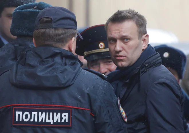 Aleksej Navalni je bil po vrnitvi v Rusijo nemudoma aretiran. FOTO: Maxim Shemetov/Reuters&nbsp;
