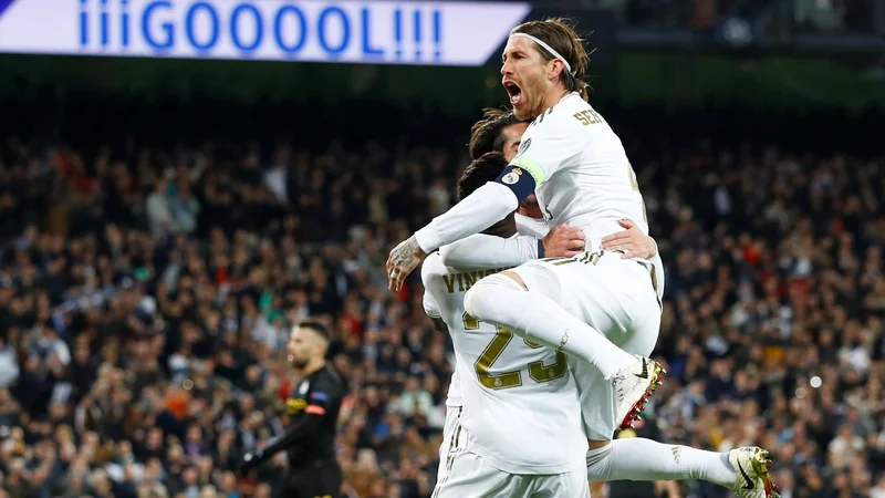 Fotografija: Sergio Ramos pooseblja fanatično bojevit pristop madridskega Reala, ki bo drevi na preizkušnji v Nemčiji. FOTO: Juan Medina/Reuters